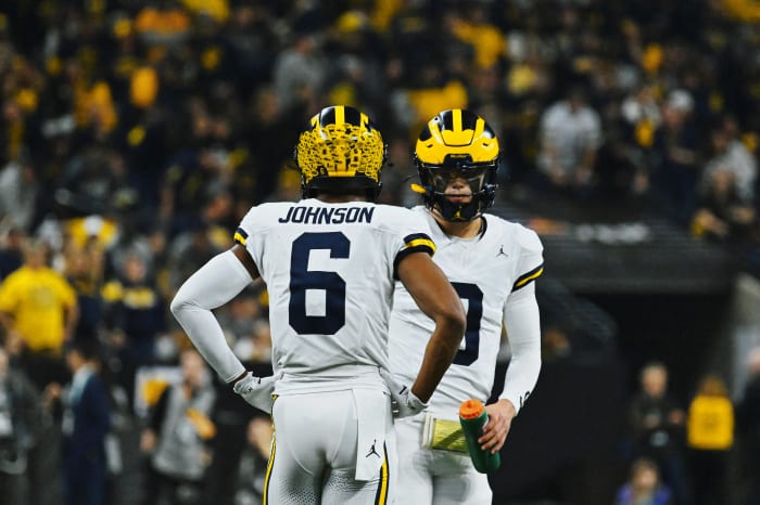 JJ McCarthy, Cornelius Johnson